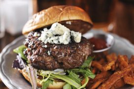 gourmet burger with blue cheese and sweet potato fries