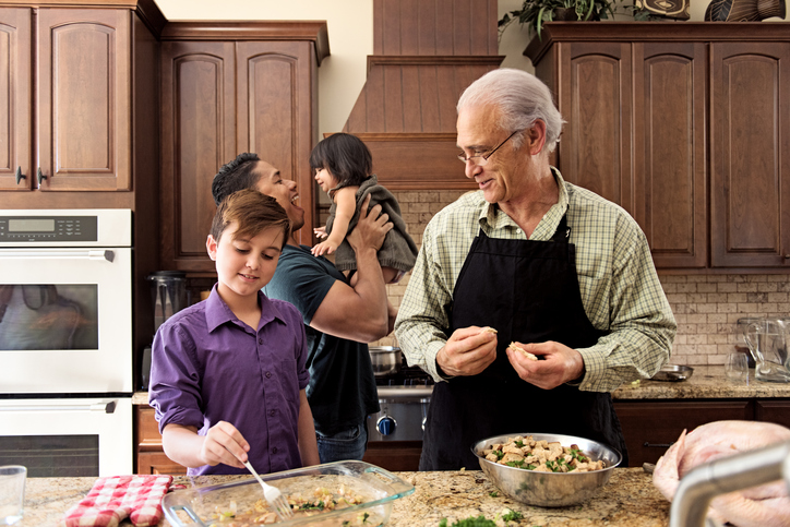 Blended Family preparing thanksgiving dinner together